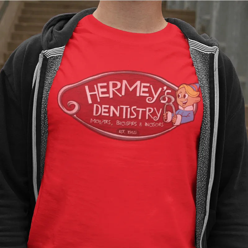 close up of the hermey's dentistry holiday themed shirts.