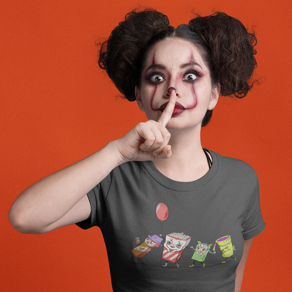 scary woman wearing horror t shirts with monster movie illustration in charcoal and pennywise face paint