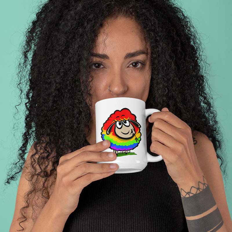 stylish woman holding lgbt merchandise rainbow sheep of the family mug