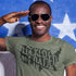 close up of saluting man wearing heather olive locked and loaded gun shirt by dodo tees