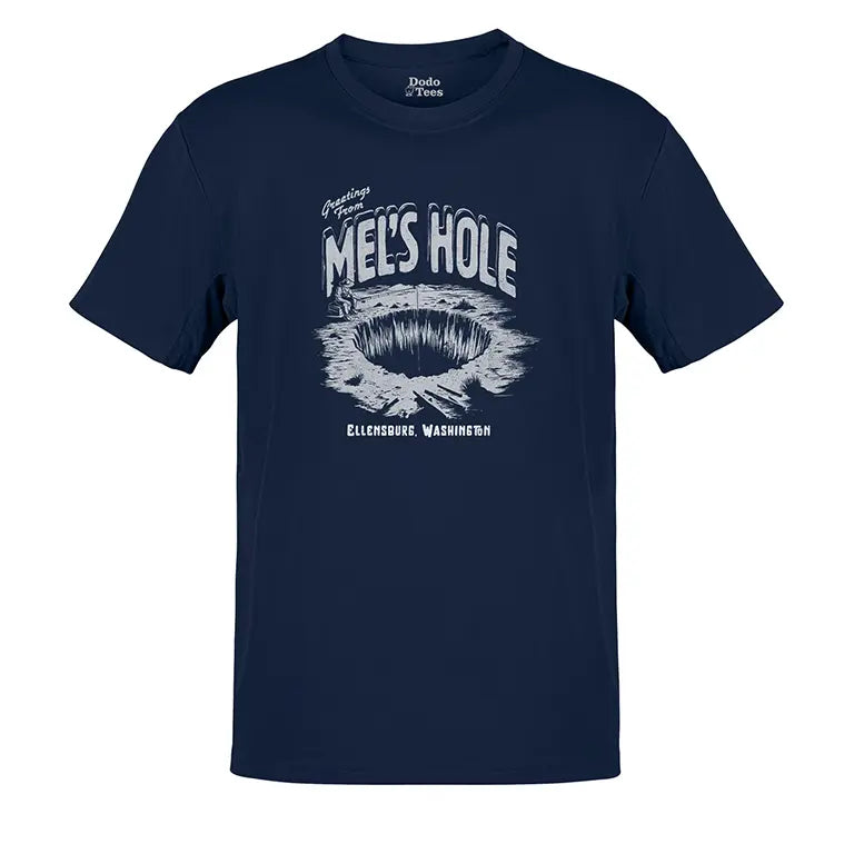 The Mels hole shirt is navy blue and features a Dodo Tees illustration reading Greetings from Mens from Ellensburg Washington.