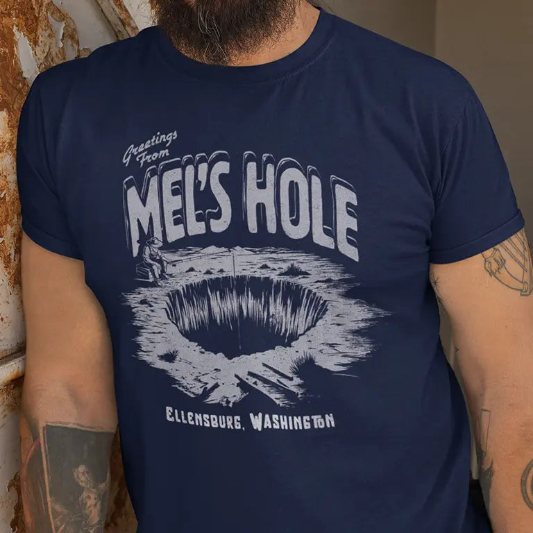 Mels Hole Ellensburg, Washington shirt. The crew new printed tee is navy blue.