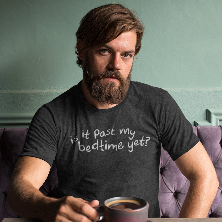 man wearing a mens funny t shirt and drinking coffee. The funny old man shirts are printed using premium inks and materials.
