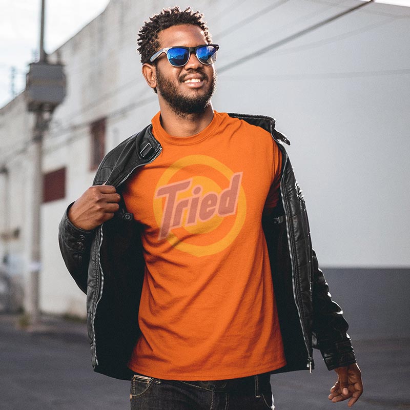 man in leather jacket and mens gym apparel tried orange t shirt