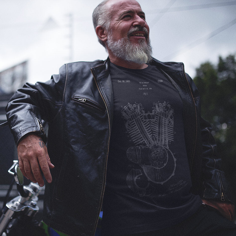 Biker wearing a Dodo Tees mens Harley shirt featuring the 1923 Harley Model 23 JS engine patent. The Biker Apparel makes Exceptional Motorcycle Gifts For Him.