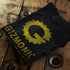 close up view of folded movie t shirt with gizmonic institute distressed logo by dodo tees