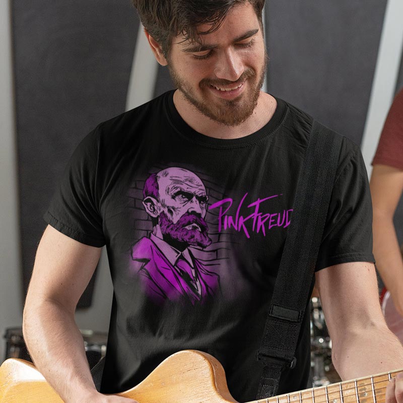 Man wearing the Pink Freud psychology gift while playing guitar. The band t shirt blends Floyds Band art with Freud