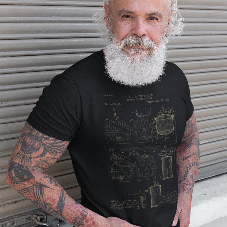 Tattooed Man wearing the Dodo Tees beer t shirts featuring 1893 Zwietusch patent for making beer. Science T Shirts That Spark Conversations.