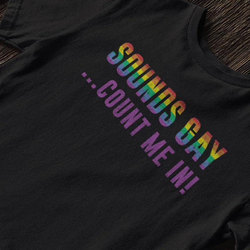 detail view of rainbow clothing sounds gay count me in t shirt