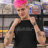 man at record store wearing soft funny t shirt that reads i put the fun in dysfunctional 