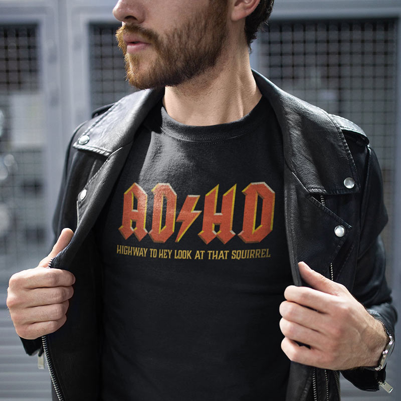 Man modeling Stocking stuffers for men. Dodo Tees ADHD shirt.