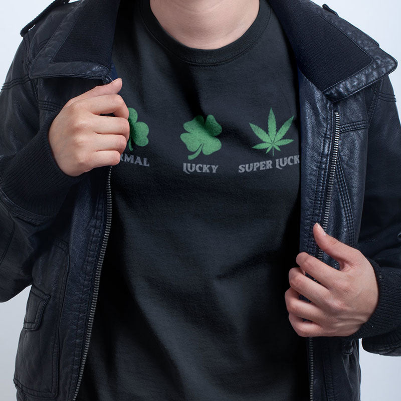 close up of man in jacket wearing super lucky st patricks day weed shirt