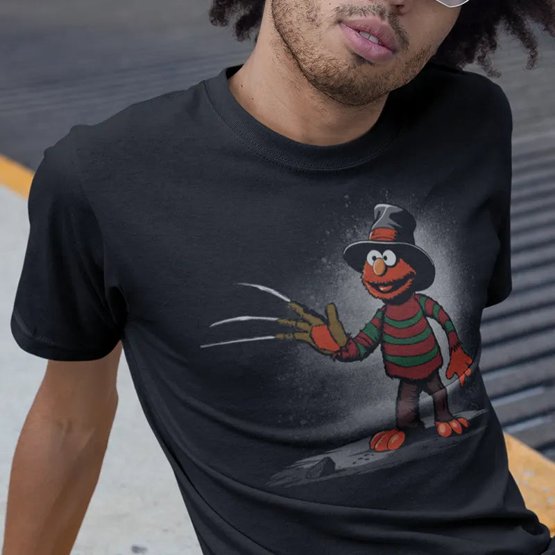 close up view of a man wearing unique tee with monster mashup illustration