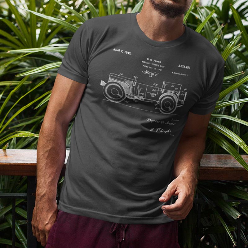 close up view of model wearing off roading shirt with willys patent in charcoal