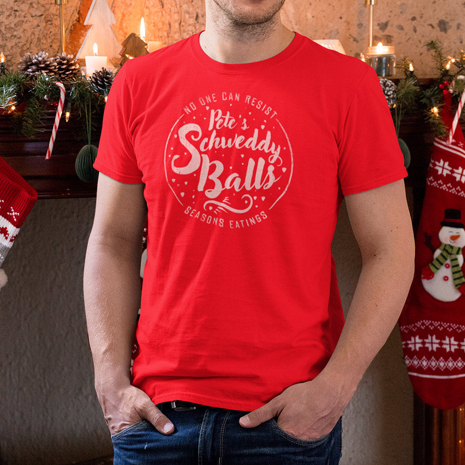 man wearing petes schweddy balls shirt by dodo tees. The Holiday Themed Shirts make Hilarious Stuffers For Dad.