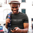 man laughing at phone wearing sarcastic t shirt with not today karen typography. The Millennial Shirt utilizes a distressed printing style for a vintage vibe.