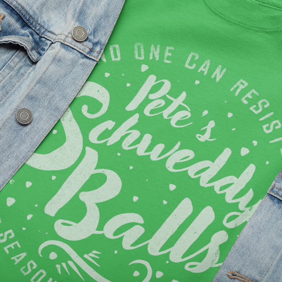 close up of schweddy balls shirt by dodo tees. The Mens Funny Christmas Shirts are Crafted with preshrunk, buttery soft fabric.