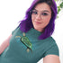 woman with purple hair taking selfie wearing surfing t shirt with beach vibes turtle illustration. We Stand Behind Our Beach Shirts For Ladies With A 30 Day Guarantee